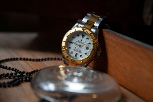 Vintage Yellow Gold and White Gold Watch on a wooden table